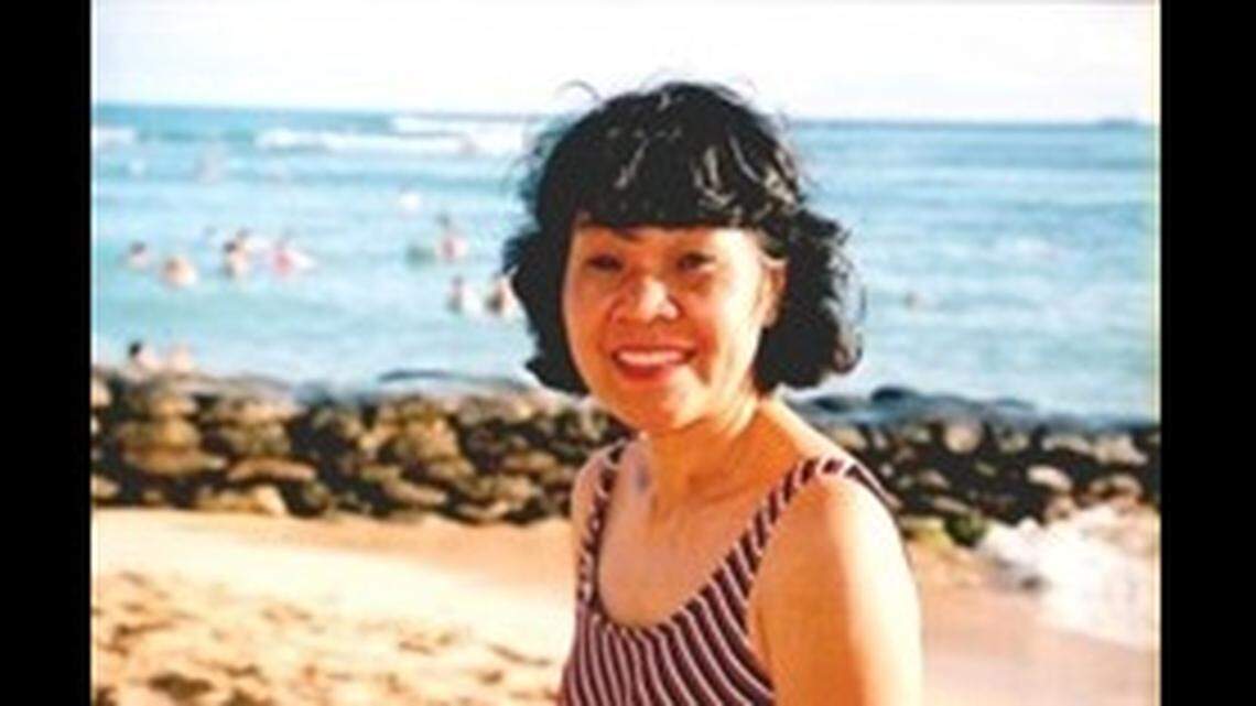 This photo of Terrie Nguyen as a young woman at the beach accompanies her obituary, posted by Lake View Funeral Home & Memorial Gardens in Fairview Heights.