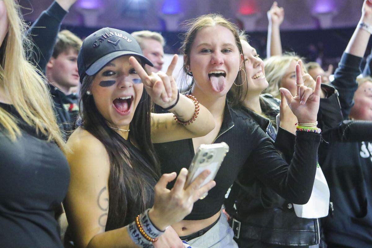 Gibault fans celebrate after Saturday’s IHSA Class 1A state championship game against Scales Mounds at the State Farm Center on the campus of the University of Illinois. Gibault ultimately prevailed 65-45 to claim the state title.