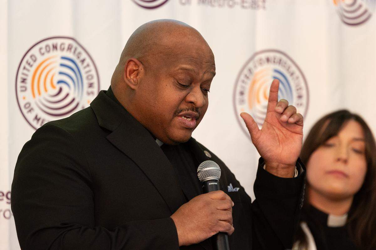 Charles Burton, a reverend at Unity Fellowship Church in Godfrey, speaks on Friday during an event hosted by United Congregations of the Metro-East, an interfaith nonprofit dedicated to social justice issues. “Christian nationalism is empire dressed in the garments of the church, but lacking the heart, compassion and the grace of Christ,” Burton said.