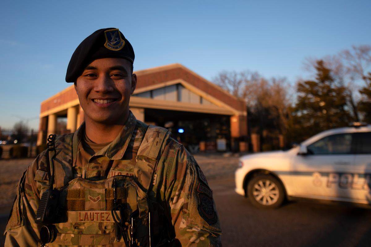 U.S. Air Force Airman 1st Class Keith Lautez, 375th Security Forces Squadron entry controller, poses for a photo on Scott Air Force Base. Lautez is certified as a Phoenix Raven, who are specially trained security forces personnel that provide security for Air Mobility Command aircraft transiting high terrorist and criminal threat areas.