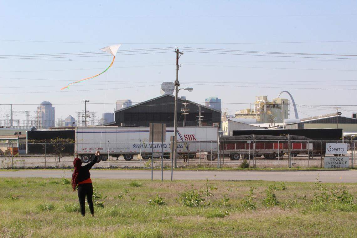 East St. Louis resident Janaha Stennis, 17, flies a kite with the words “Earth Day 2021” written on it at a rally organized by United Congregations of Metro East in Sauget on Thursday, April 22, advocating for the Clean Energy Jobs Act and banning the incineration of PFAS chemicals.