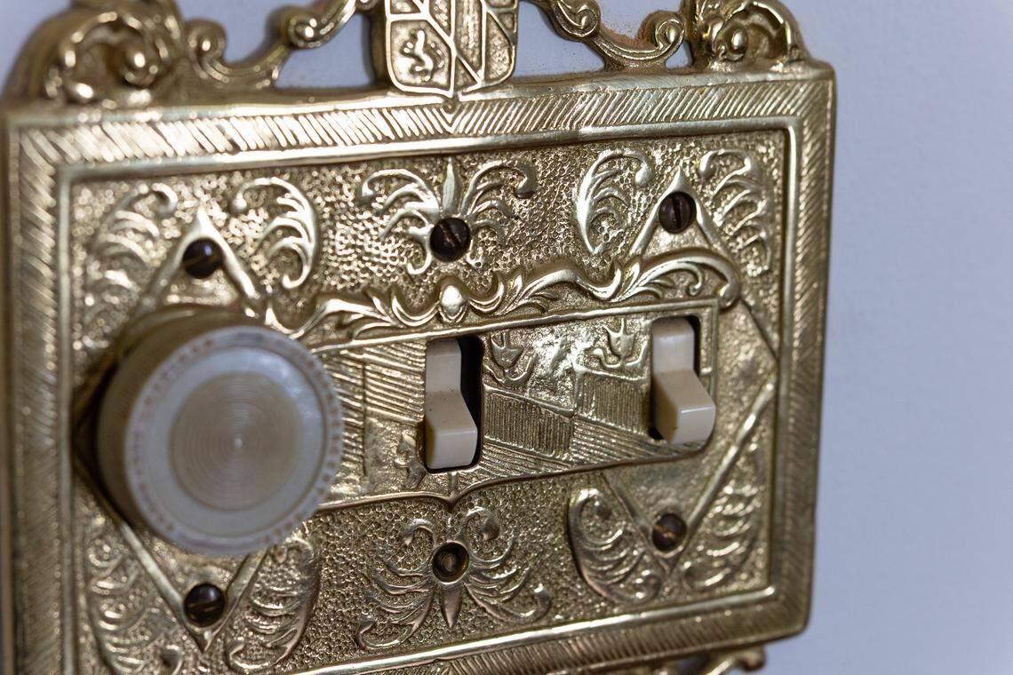 Ornate light switch cover plates are found throughout the home.