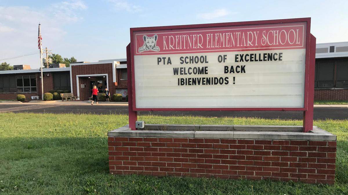 A sign outside Kreitner Elementary School in Collinsville welcomed students back in both English and Spanish on the first day of school in this 2021 file photo. It is one of 11 schools in the Collinsville Unit 10 school district, which has the largest population of Hispanic students and families in the region.