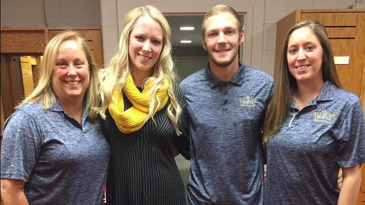 Tony Miner (second from right) has served as an assistant under former coach Sara Thomas-Dietrich (second from left) for two runs at an IHSA volleyball state championship. He was hired to take over for Thomas-Dietrich, who moved on to be an assistant at Missouri State. Abby Thomas (far right) will become the junior varsity coach, while Kathy Wuller (far left), a former head coach and assistant, has decided to retire.