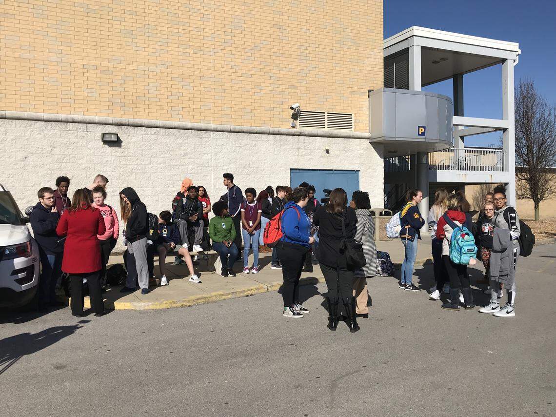 At 10 a.m. Wednesday, March 14, in the rear of O'Fallon Township High School Smiley campus, 600 S. Smiley St., roughly 50 student​s walked out of classes as a part of a national protest to support the 17 people who died as a result of a school shooting in Parkland, Fla., despite warnings from the plans by OTHS District 203 administration to issue disciplinary action.