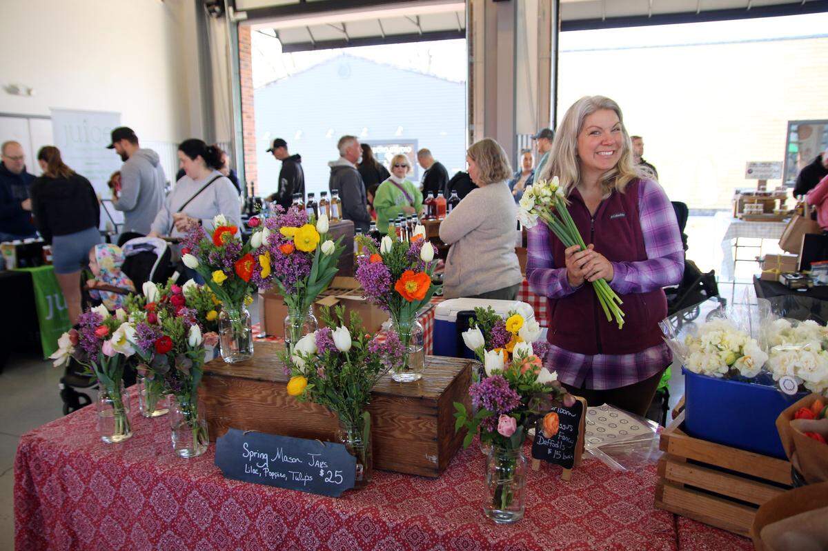 Flower vendor at a previous market event