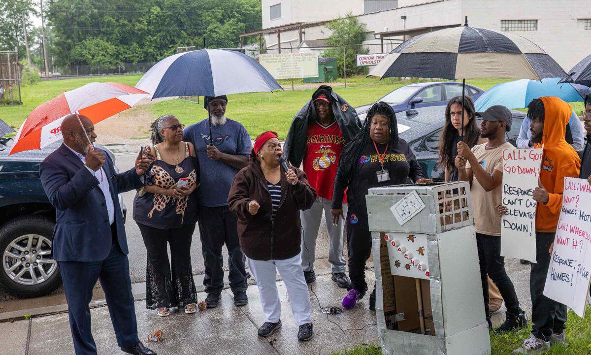 Rev. Norma Patterson of Good Shepherd of Faith United Church of Christ speaks at a demonstration Tuesday outside the East St. Louis Housing Authority administrative offices. She and other activists from United Congregations of Metro-East hoped to draw attention to issues at the Orr-Weathers housing complex.