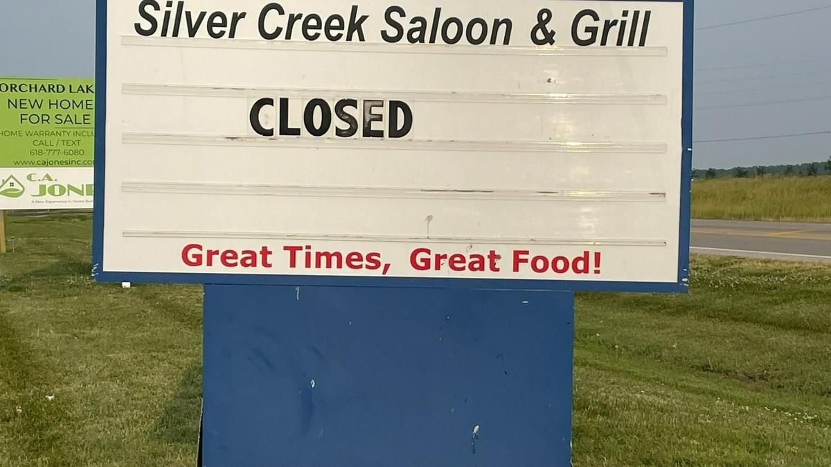 Closed sign on Silver Creek Saloon & Grill at 2520 Mascoutah Avenue, Belleville, on June 5, 2023. There also was a closed sign on the entrance door leading to the inside of the darkened restaurant and bar.
