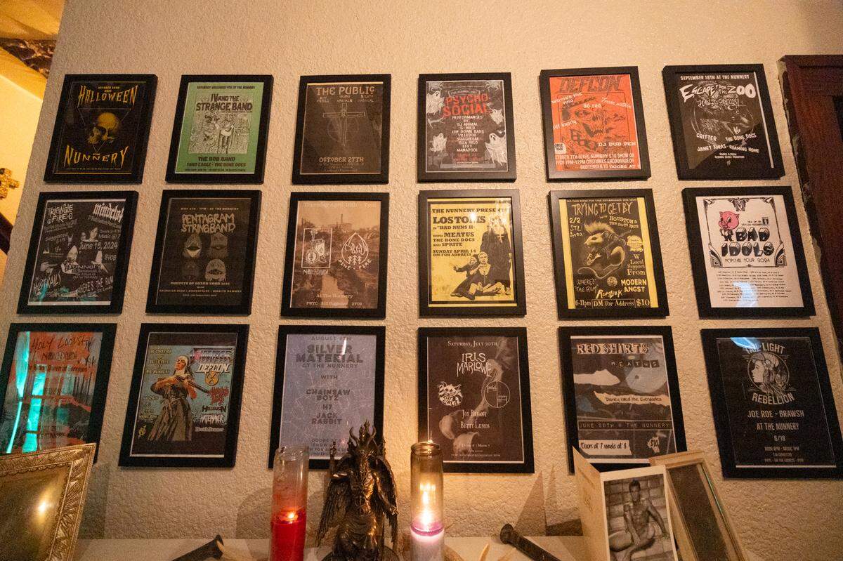 A wall displaying posters for artists who have performed at the Nunnery over the years. Though the space primarily hosts local artists, there have been a few notable national acts roll through — namely Coleman Williams, the great grandson of Hank Williams.