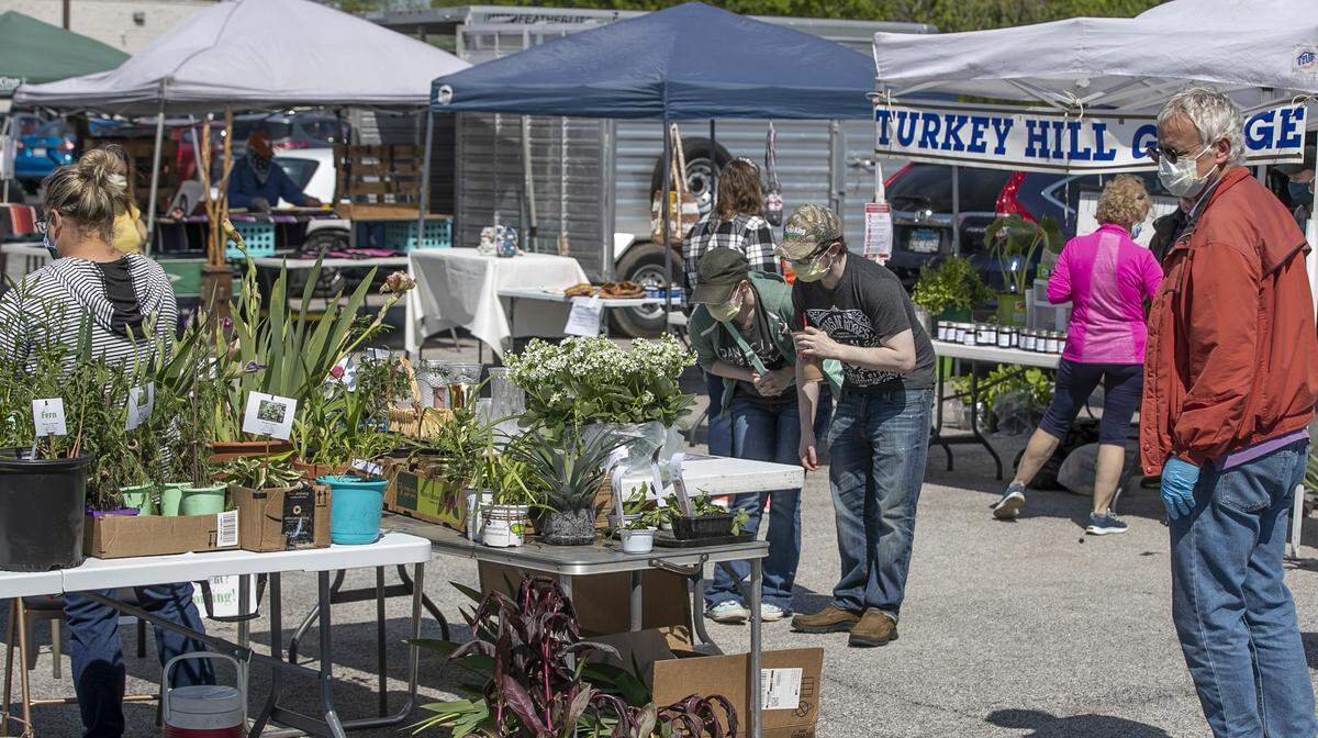Customers at the Swansea Farmers Market shop for items. The market is open from 10 a.m. to 2 p.m. Thursdays and located on the Rural King parking lot, 2801 N. Illinois St., Swansea, behind Burger King.