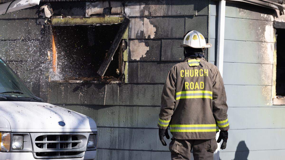Firefighters battle a house fire at 19 St. Gregory Dr. in Cahokia Heights on Feb. 23, 2024.