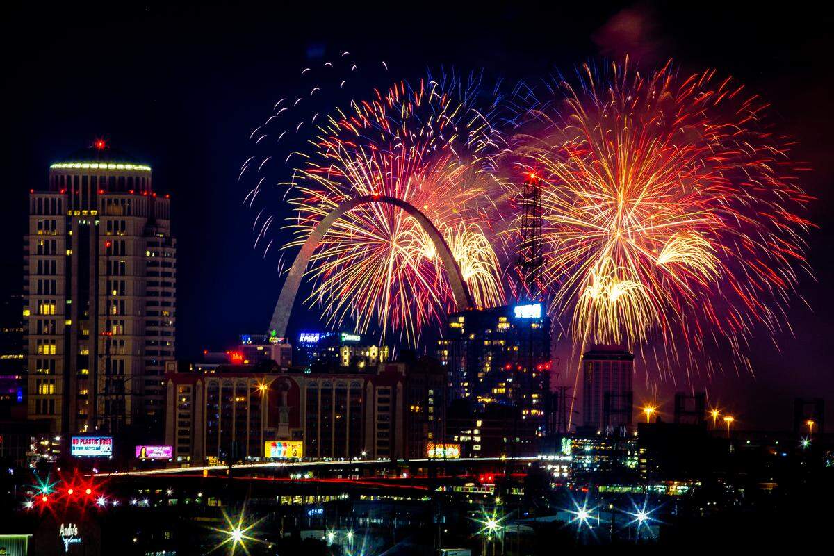 Fireworks blast over the Gateway Arch and St. Louis’ skyline on July 4, 2024, in downtown St. Louis.