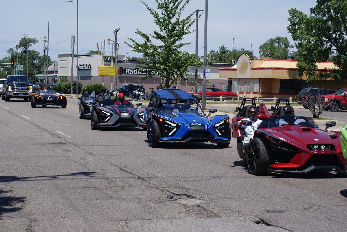 A Juneteenth motorcade cruises on State Street in East St. Louis Saturday.