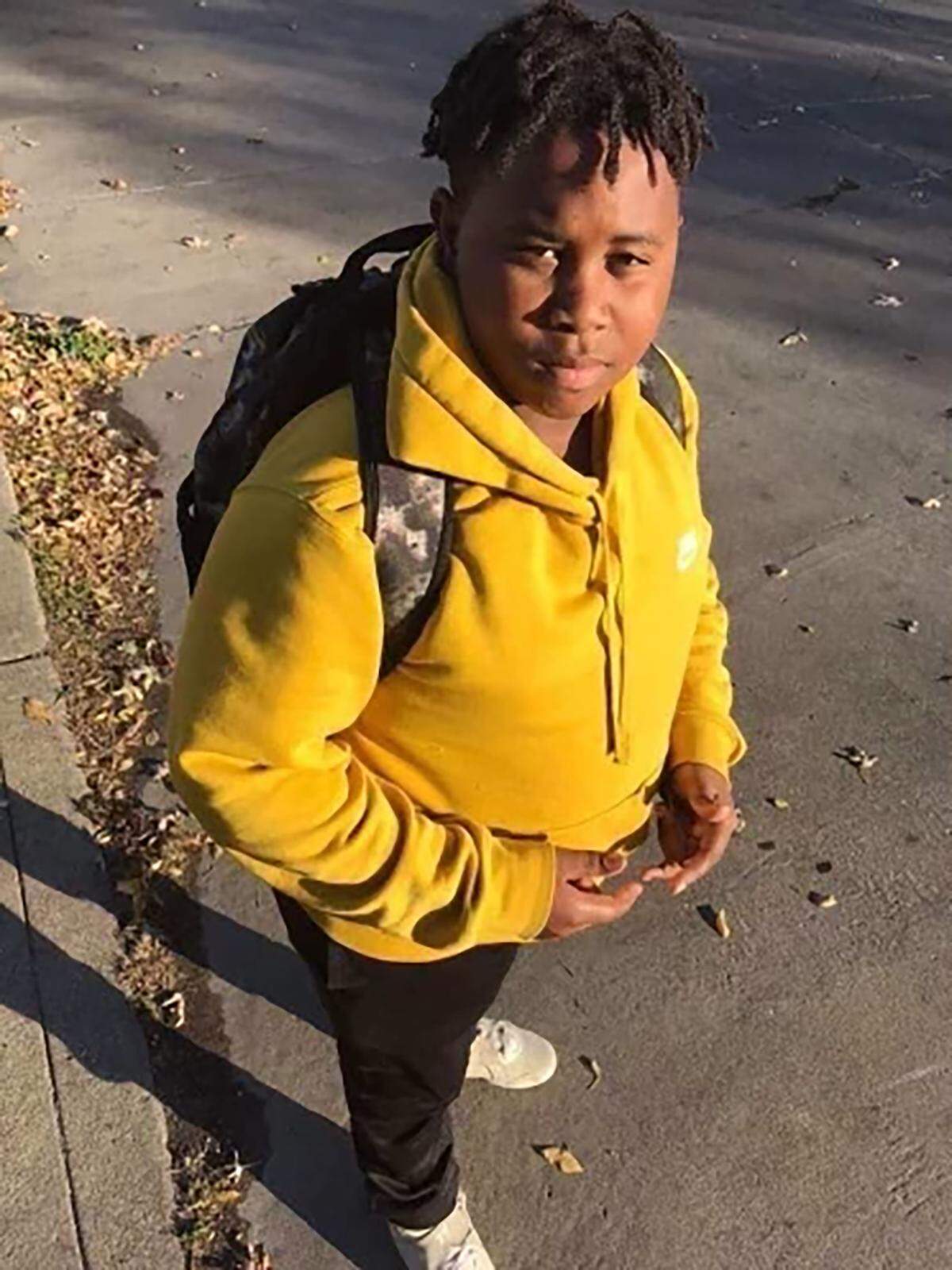 Johnny R McCline, 13, was killed in Washington Park, Illinois.