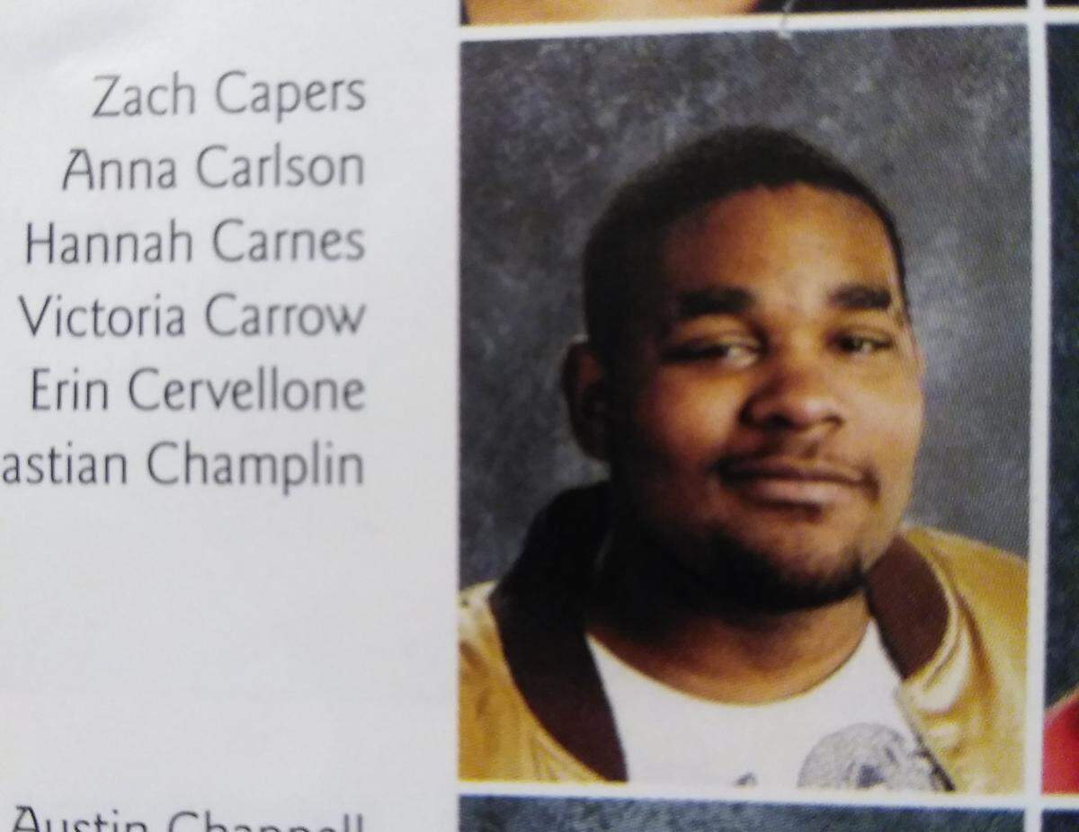Zachary Capers is shown in the Edwardsville High School yearbook in 2012, when he would have been a junior. He was charged Tuesday with first-degree murder in the stabbing deaths of a local couple.
