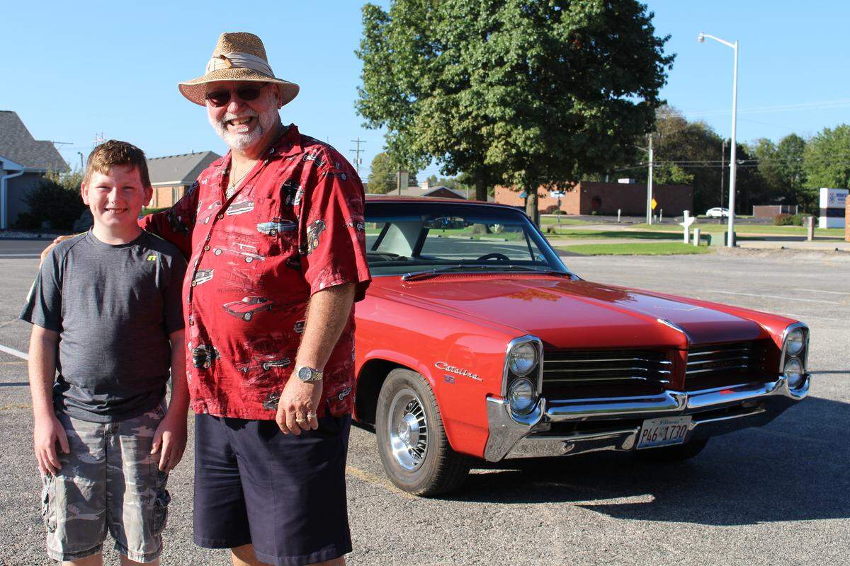 Doug Callies, of Edwardsville, and his great-grandson, Jimmy Schehl, 11, showed up for the Wild Cherry Van Run kick-off in Maryville in a 1964 Pontiac Catalina.