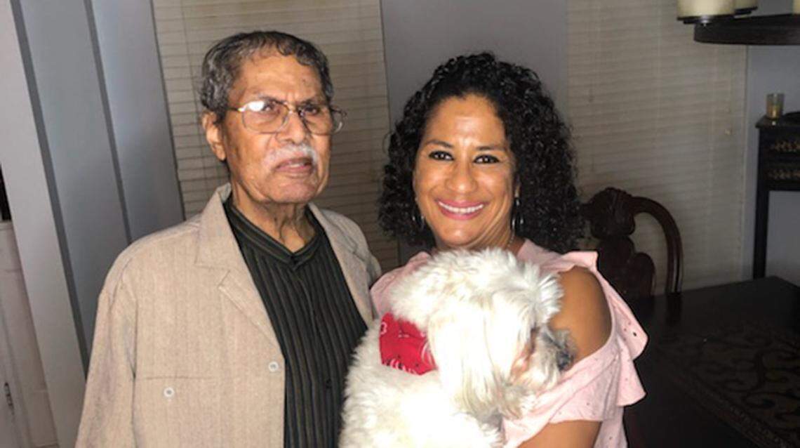 Janfrey Preston and Elise Preston Mallory holding Sam in June of 2019.