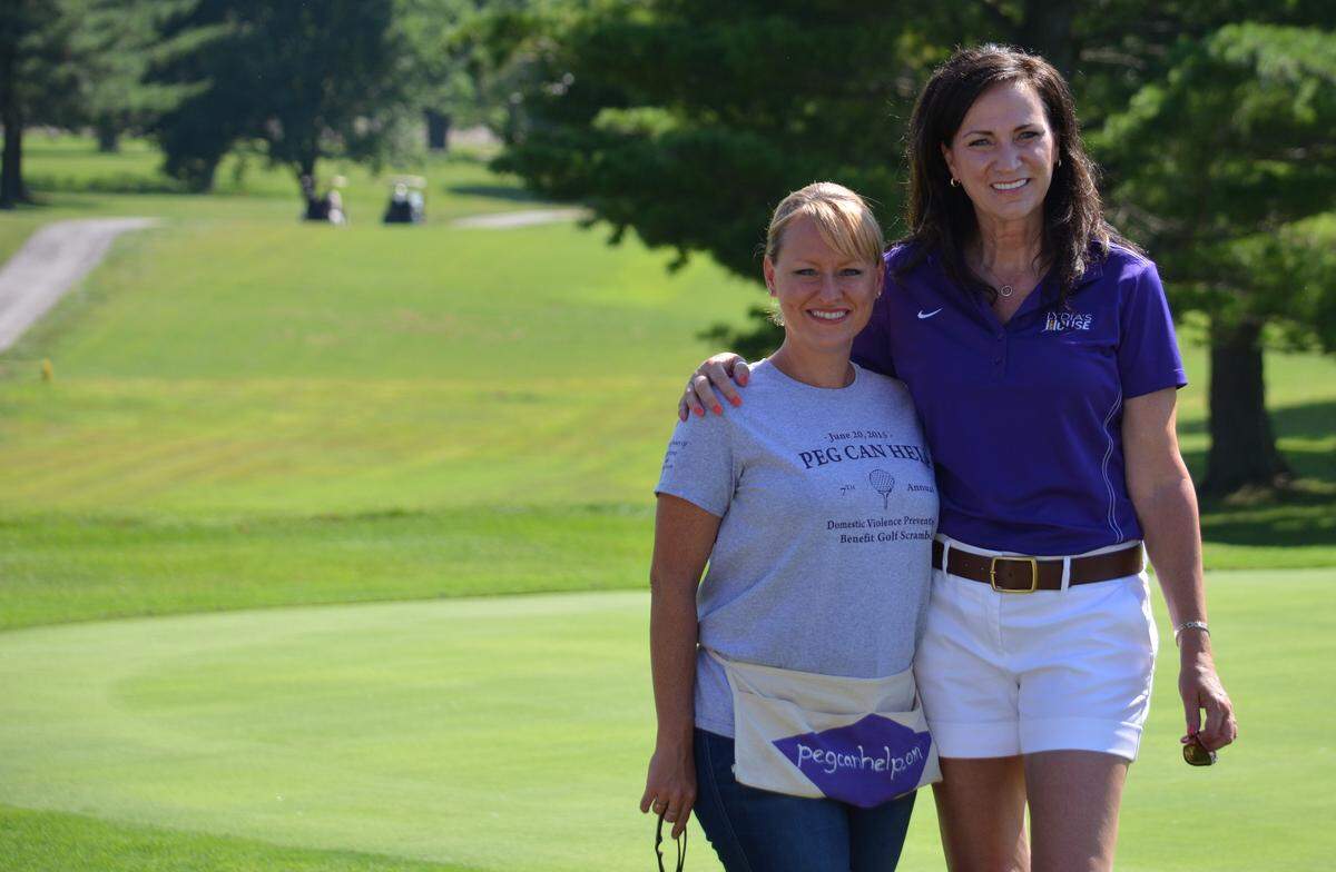 Rachel Budko, left, organizes a golf tournament that benefits Lydia’s House, which helps battered women and their children. Karen Kirk is its executive director.
