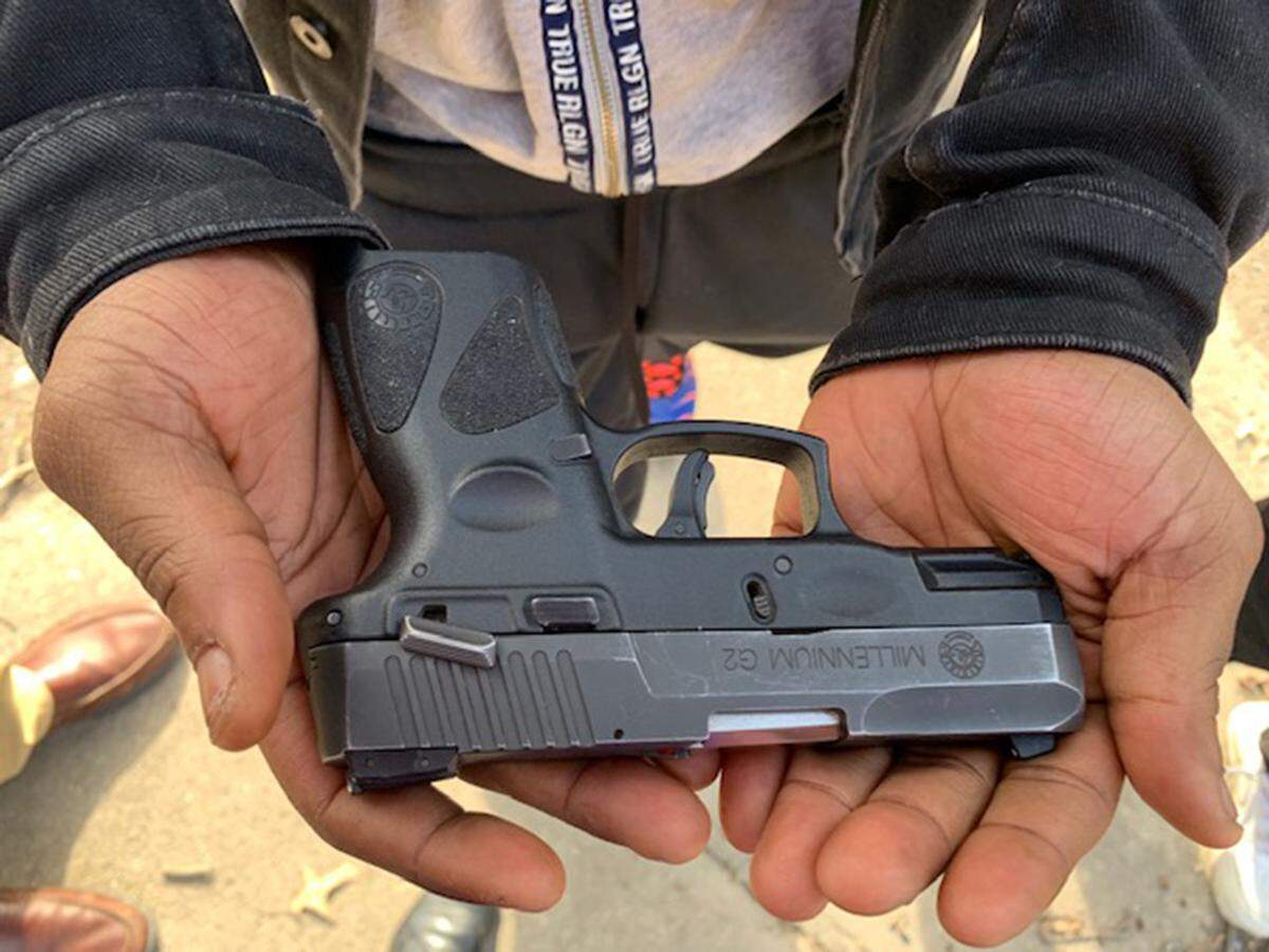 During an interview, a 22-year-old East St. Louis resident, flashed an easy smile when a reporter asked to see his gun. He nodded in the direction of a dumpster, walked over to it, opened his coat and slipped a handgun out of the inside pocket. It was marked “Millennium G2,” an 11-shot, .40 caliber semi-automatic pistol.