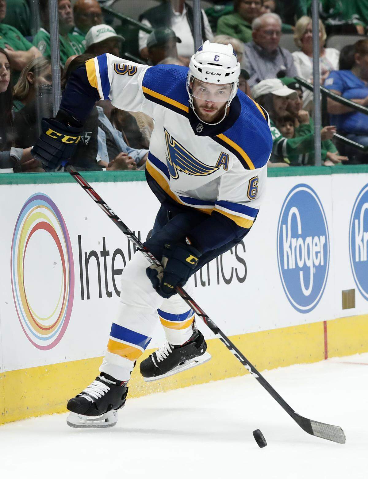 Joel Edmundson (6) moves to control thse puck in the first period of a preseason NHL hockey game against the Dallas Stars in Dallas, Monday, Sept. 16, 2019. (AP Photo/Tony Gutierrez)