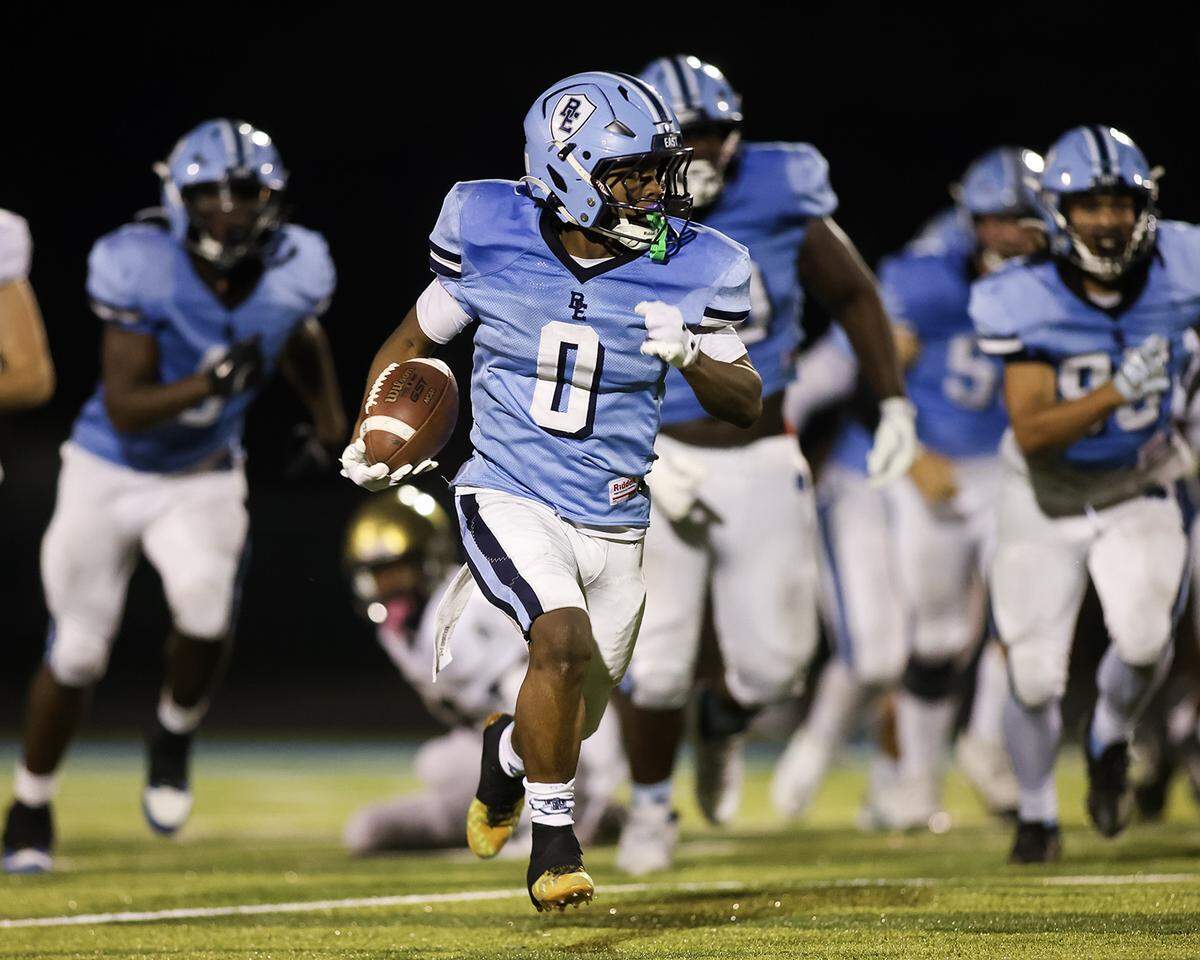 Jaedon Beamon carries the ball during Friday night’s intracity matchup between Belleville Althoff and Belleville East. 