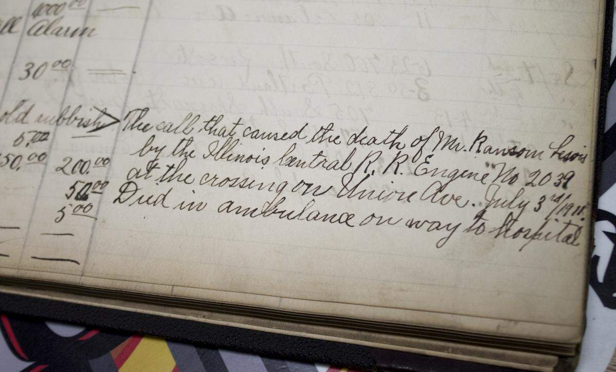 A Belleville Fire Department ledger entry from July 3, 1911 documenting the death of Belleville fireman Ransom Lewis.