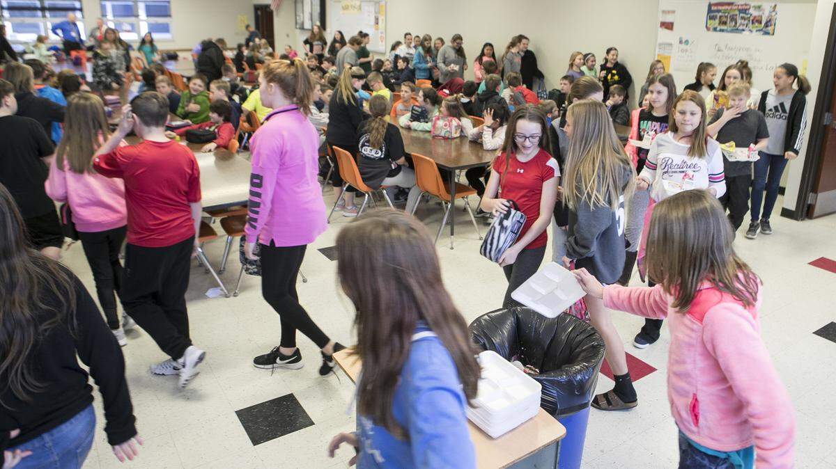 Triad Middle School 6th grade students eat lunch in March 2018. An Illinois bill could require schools to offer plant-based lunch options to students.