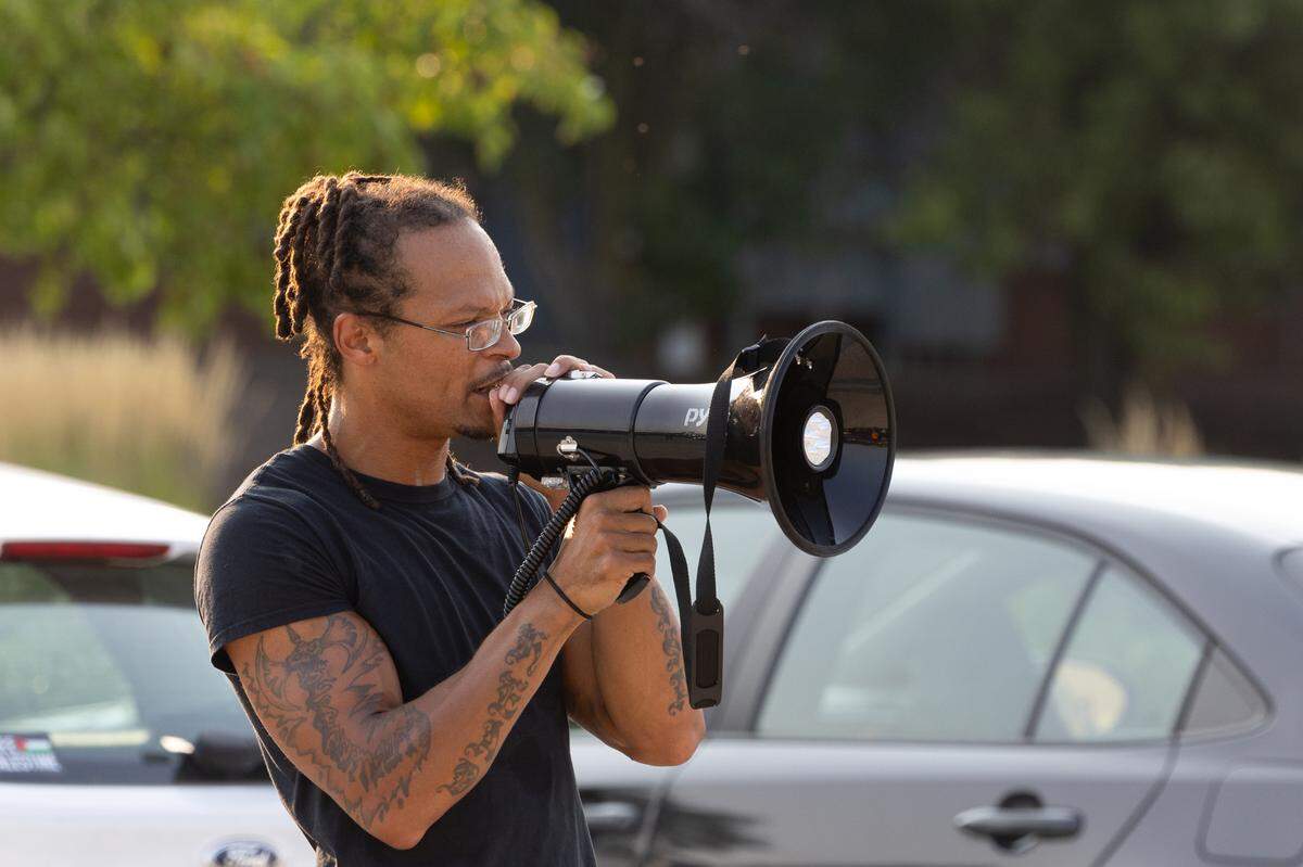 JD Dixon gives a speech during a protest in Fairview Heights on July 24, 2024 against the police killing of Sonya Massey in her Springfield, Ill. home.