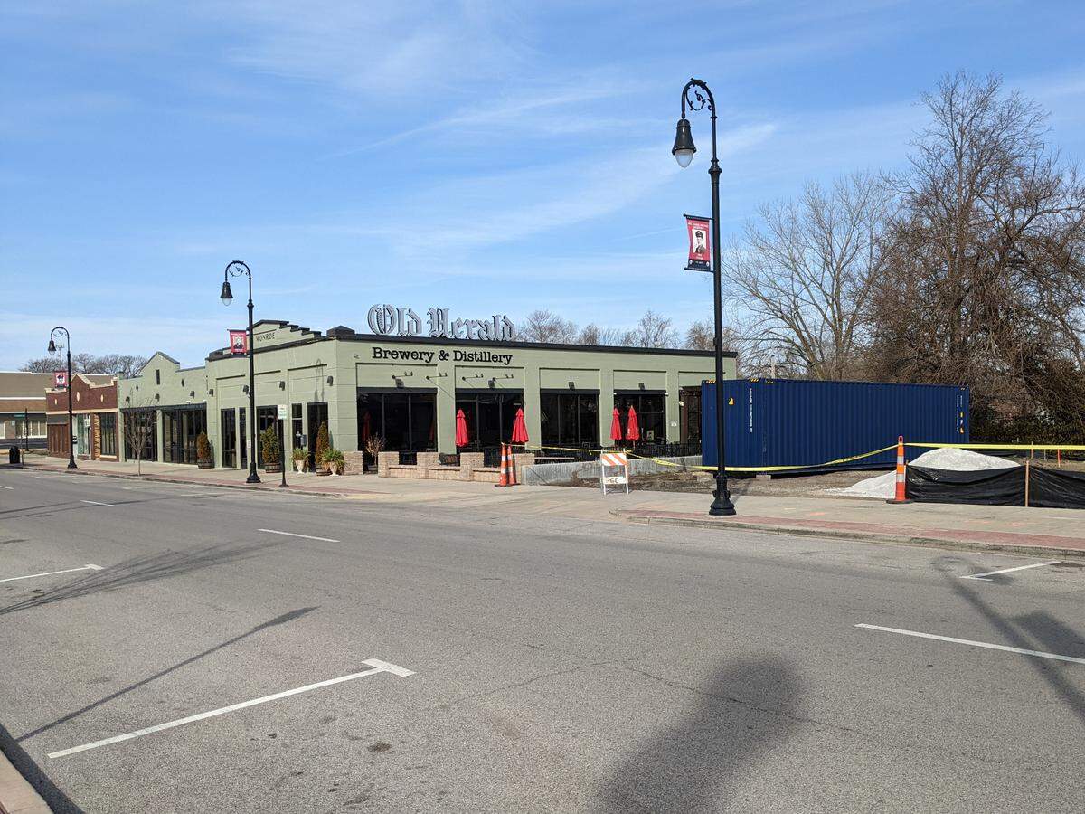 View of Old Herald Brewry & Distillery with storage container that will be converted to a restroom for the Herald Square redevelopment