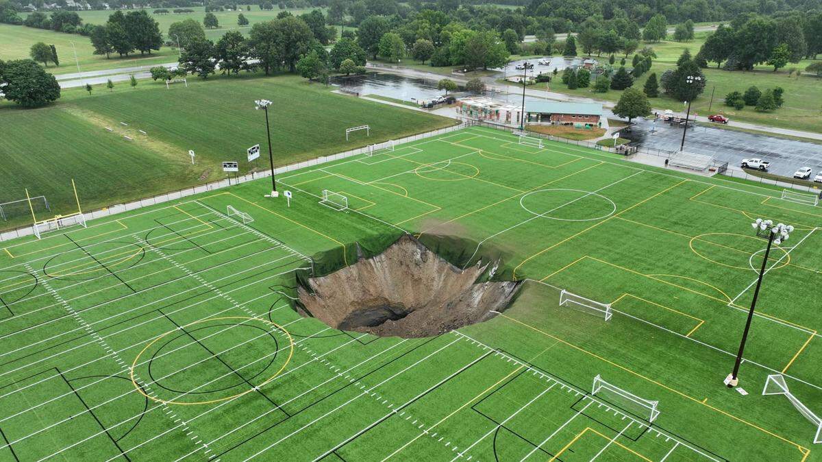 A sinkhole caused by a collapsed mine opened up on an athletic field at Gordon Moore Park in Alton.
