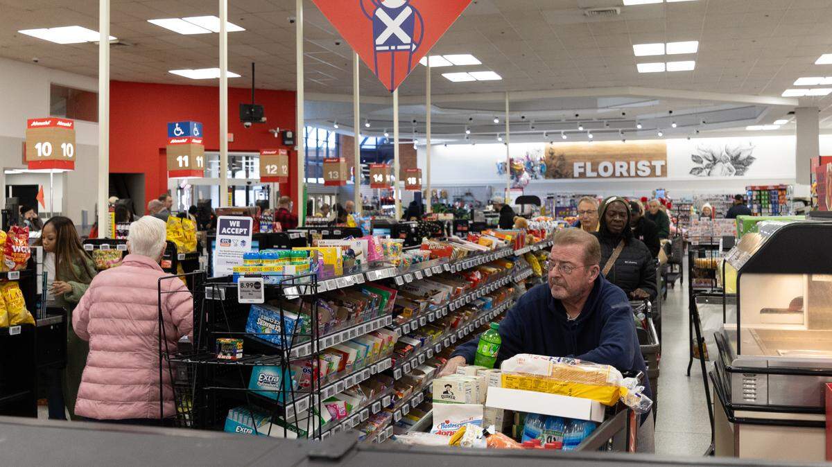 In this file photo, shoppers line up at Schnucks in Swansea in anticipation of a winter storm in January. Most metro-east municipalities will begin implementing 1% local grocery sales taxes to replace a state tax that was repealed.