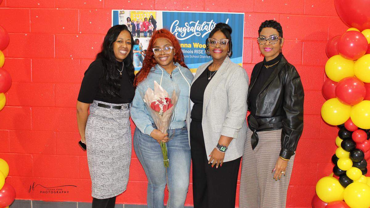 Tyonna Woodhouse, second from left, is one of only two Illinois school employees to be nominated for the national RISE Award. Woodhouse is a Homeless, Attendance and Truancy Officer at James Avant Elementary School. Pictured from left to right are Avant’s current principal Roshonda Harriel, Woodhouse, former Avant principal Quanshanda Nicholson and former Avant assistant principal Audrey Jackson-Luster.