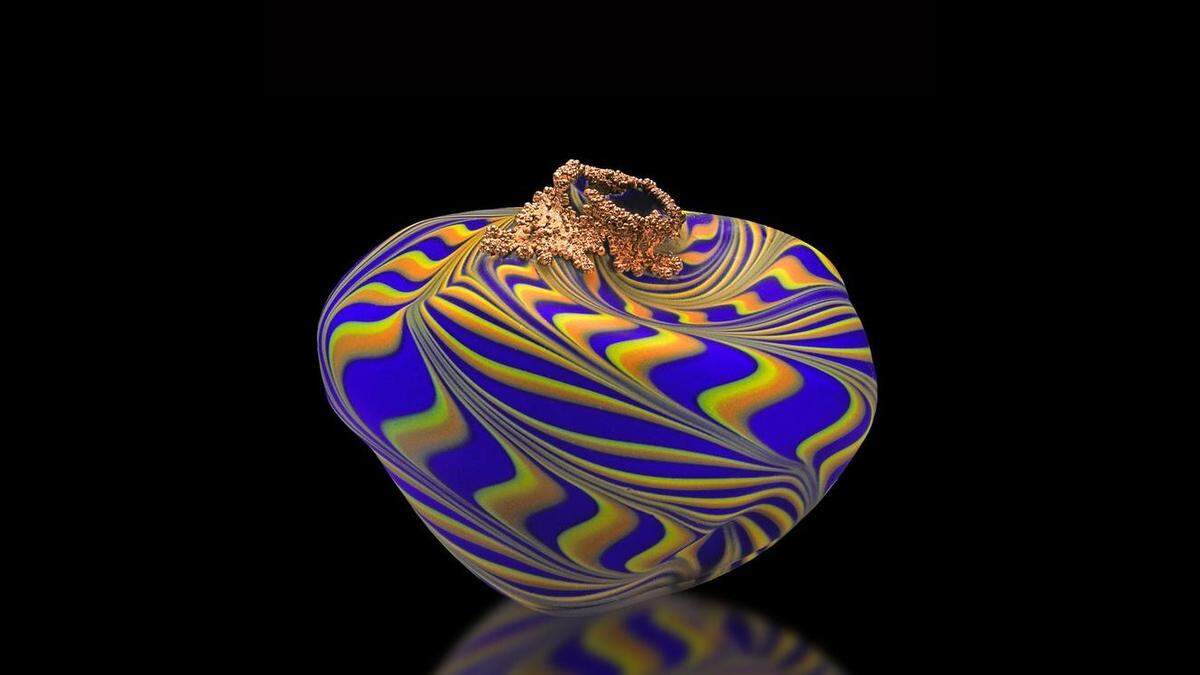 Douglas Becker won an award for excellence for his glass piece at the 2022 Midwest Salute to the Arts