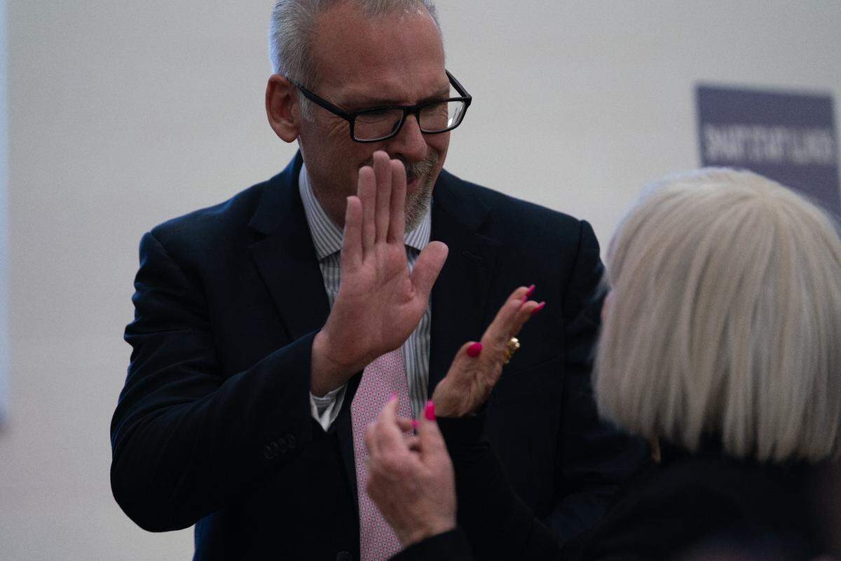 State Superintendent of Education Tony Sanders gives Belleville Mayor Patty Gregory a high-five during a press conference at Ellis Elementary on Jan. 17, 2024.