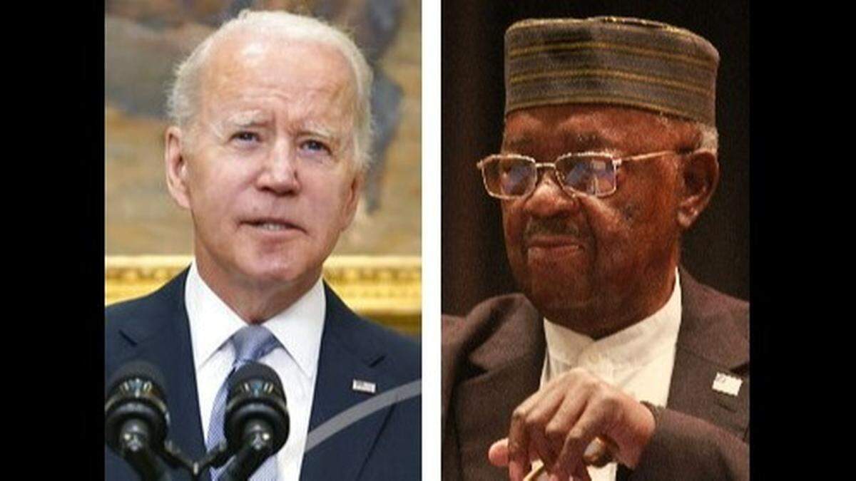 Abraham Bolden, right, is shown participating in an East St. Louis panel discussion in 2013. President Joe Biden pardoned three people, including Bolden, and commuted the sentences of 75 others last week.