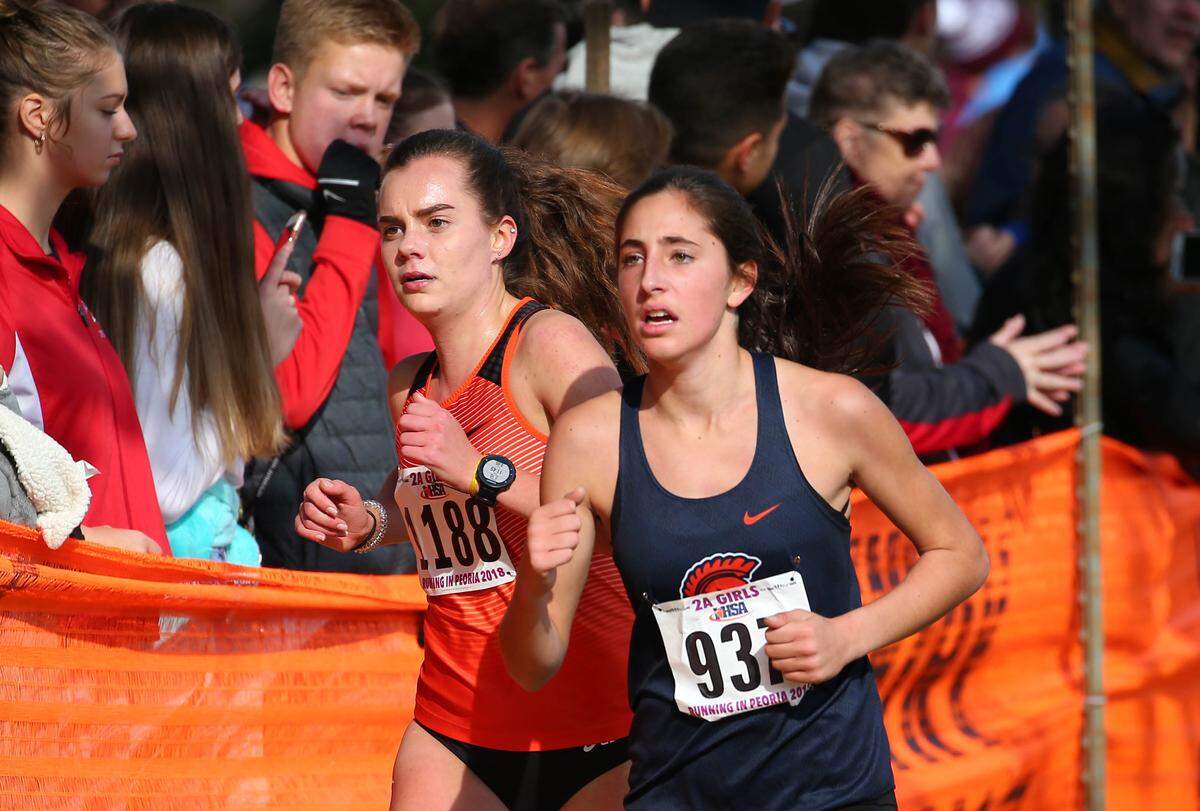 Waterloo’s Jenna Schwartz  during her run at the IHSA Class 2A State Cross Country Championships at Detweiller Park in Peoria Saturday.