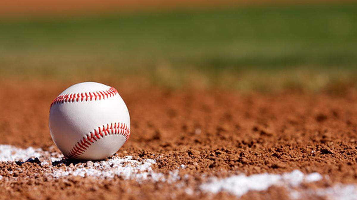 Baseball on the Chalk Line of the Infield