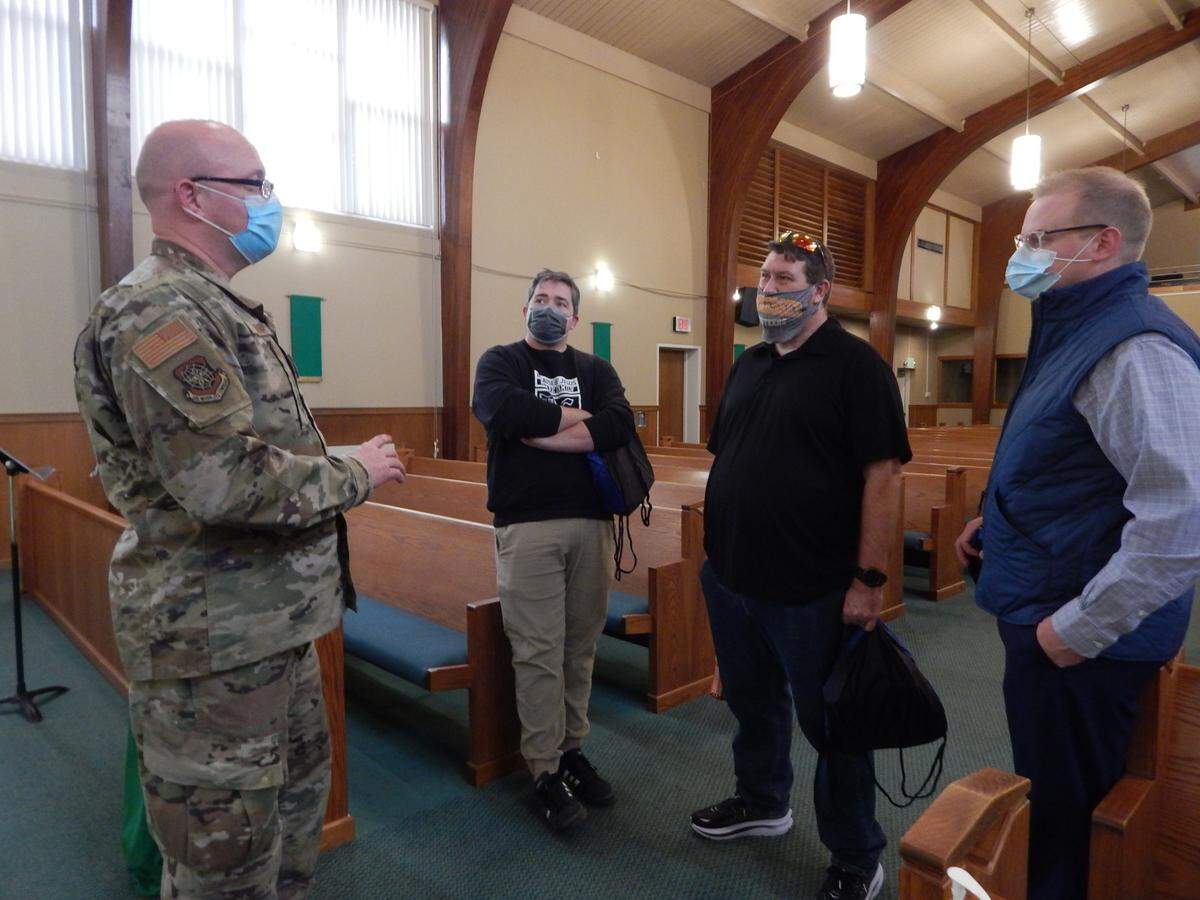 Chaplain (Capt.) Michael Farar, deputy chaplain, 375th Air Mobility Wing, talks about military lifestyle and the whole Airmen concept with local clergy, left to right, Joshua Cruse with O’Fallon Assembly of God, Josh McDowell with Central Christian Church, and Andrew Romine with Christ the King Apostolic at the Pastors Appreciation Lunch on Feb. 16.