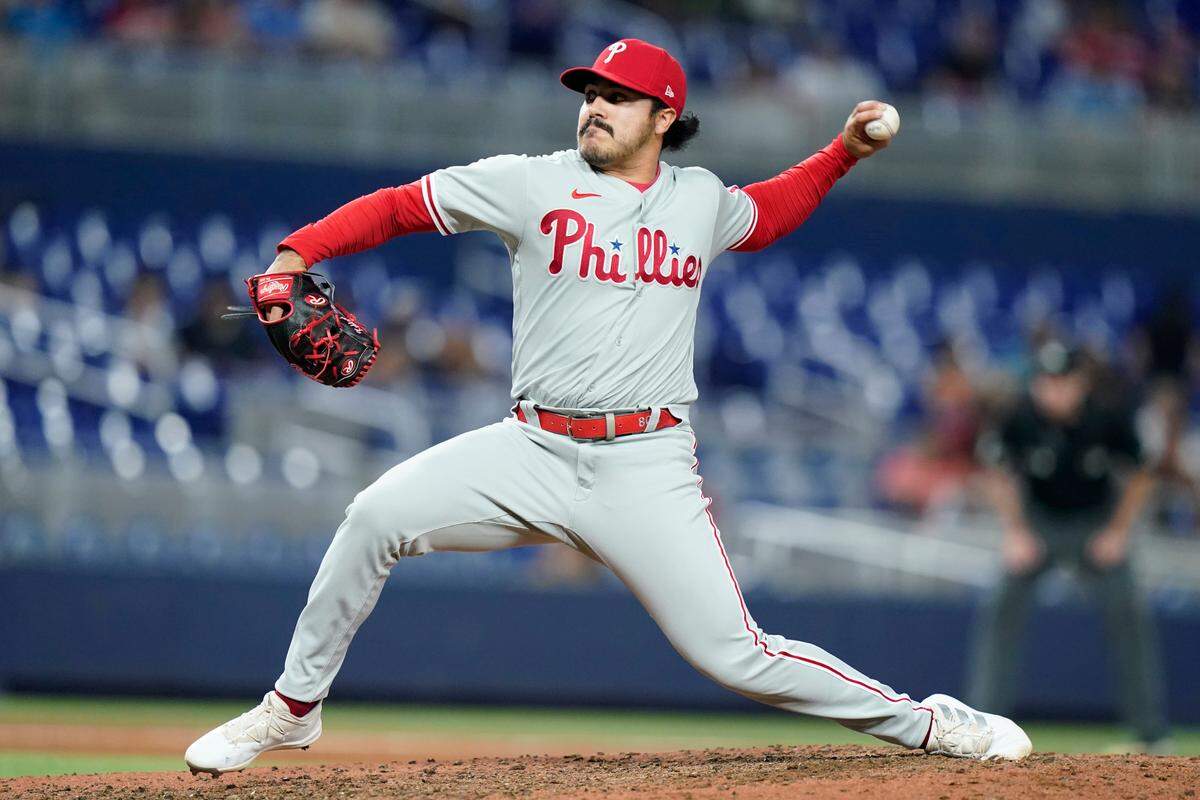 This file photo shows JoJo Romero pitching for Philadelphia during a game against the Miami Marlins on Saturday, July 16, 2022, in Miami. The Phillies traded Romero to the St. Louis Cardinals on Saturday for infielder Edmundo Sosa.