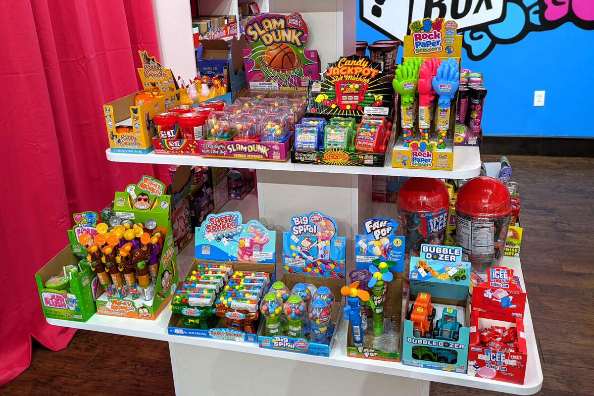 Novelty candies with toy dispensers