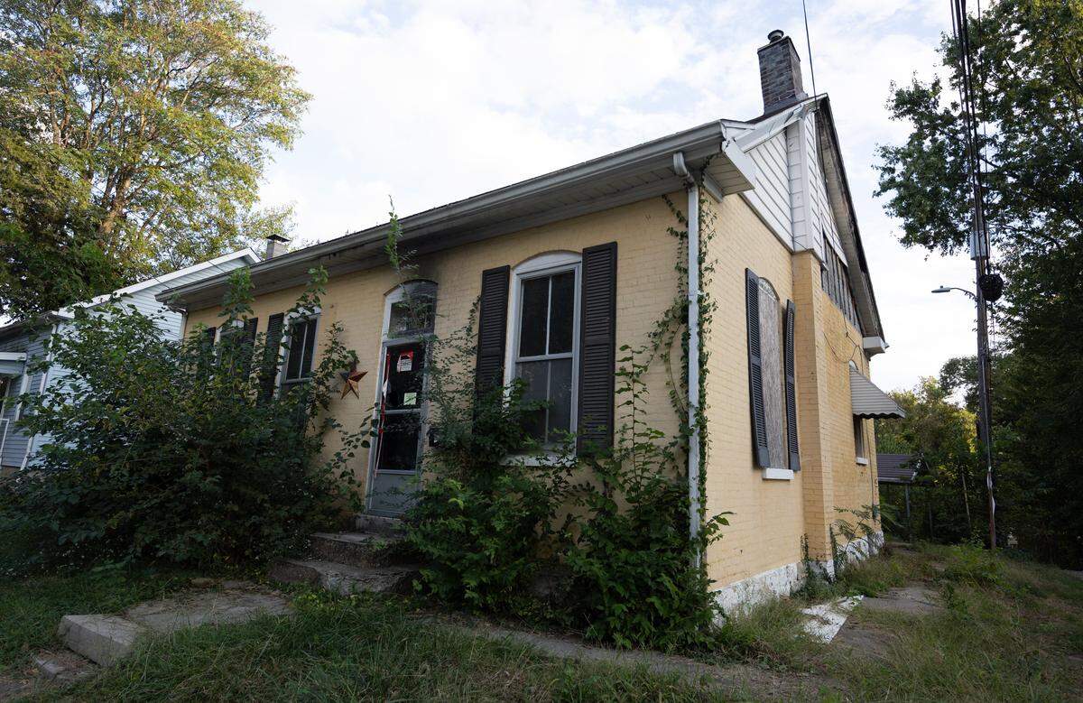 The city of Belleville is buying this German American folk house at 614 E. McKinley St. with plans to either demolish or sell it. Built in the 1860s, the brick home was damaged by a fire several years ago.