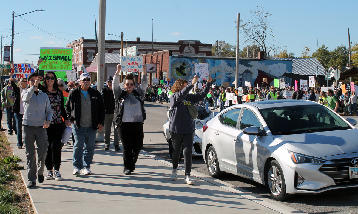 Marchers begin walking down Main Street in Staunton during a rally for Ismael Ayuzo Sandoval, who was taken into custody by U.S. Immigration and Customs Enforcement.
