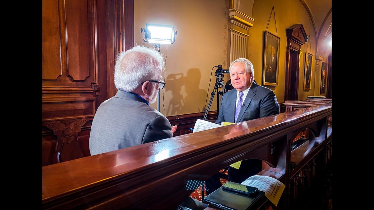 TICHENOR: Jak Tichenor (left), host of “Illinois Lawmakers” talks with House Assistant Majority Leader Jay Hoffman, D-Swansea, about a recent memo from the governor’s office to agency directors asking them to identify $800 million in budget cuts. The episode of Illinois lawmakers will be available at capitolnewsillinois.com on Friday, May 10.