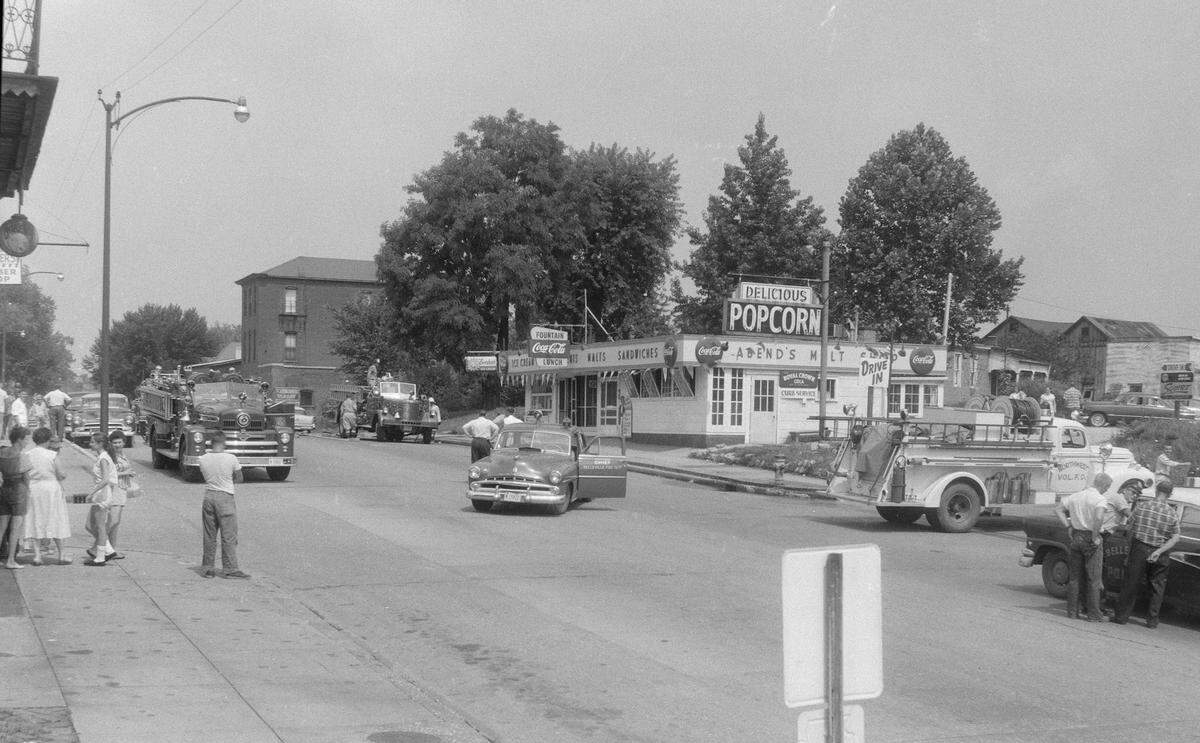 All available emergency equipment in the area was called to the properties between 1600 and 2000 West Main Street, Belleville, during the July 1958 gas explosions and fires. Pictured: Abend’s Malt Shop at 16th and Main Streets had “considerable damage.”