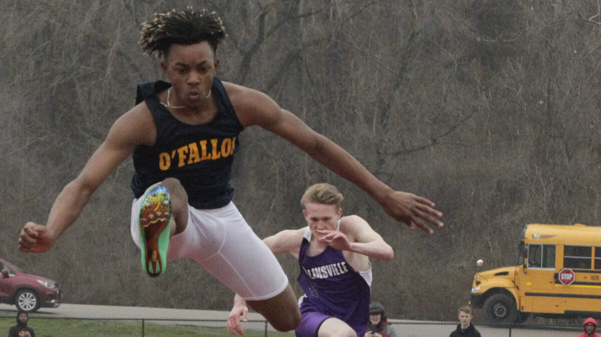 O'Fallon's Tevion Holmes jumps during a hurdles event on March 28 during a dual meet at Collinsville.