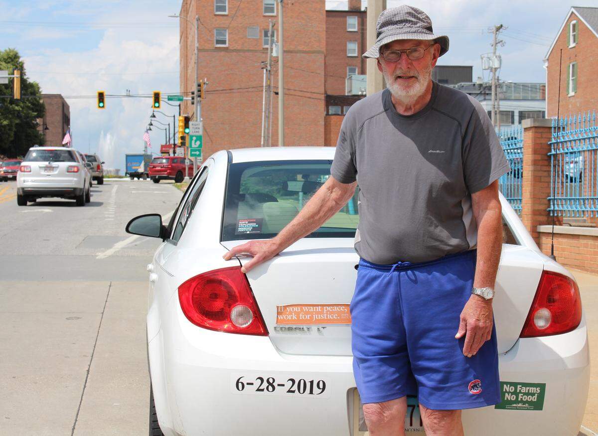The Rev. James “Clyde” Grogan, a retired priest in the Catholic Diocese of Belleville, displays a bumper sticker on his car with the date “6-28-19” in anticipation of Bishop Edward K. Braxton’s 75th birthday. Bishops are required to submit resignations at age 75, although the Pope can choose not to accept them.