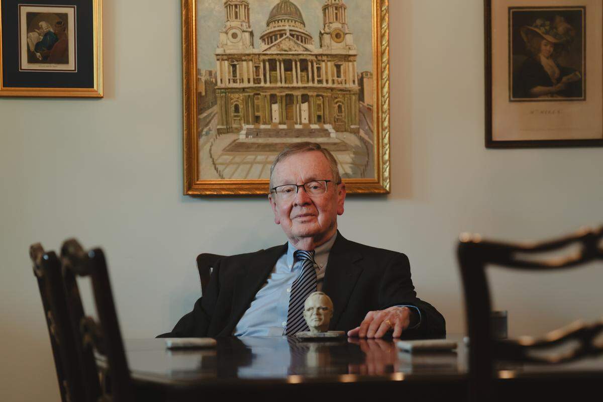 Marshall Hier sits at his dining table with a sculpture of his mentor Malcolm Martin in south St. Louis County on Wednesday, May 27, 2026.