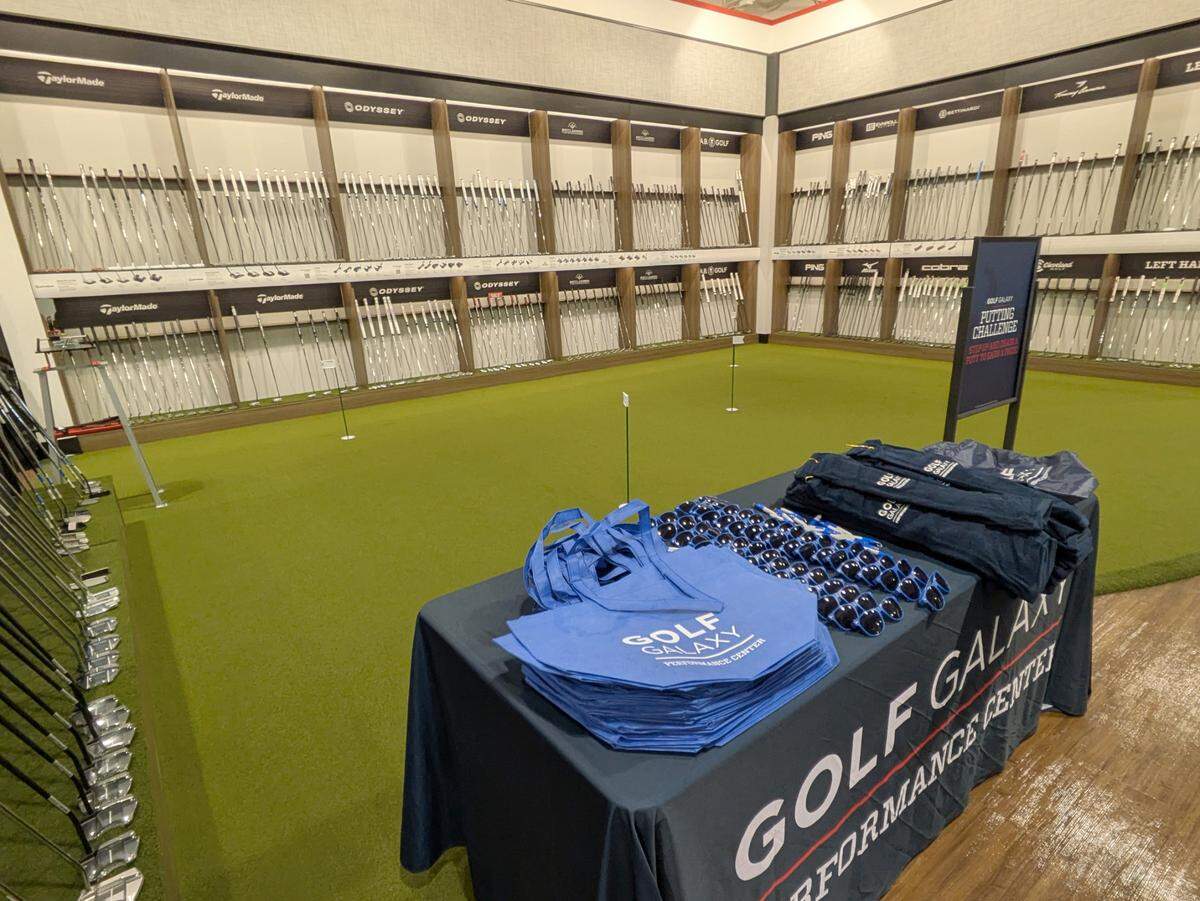 Golf Galaxy features a putting green where customers can try out the different clubs. At the grand opening, folks could putt for some swag.