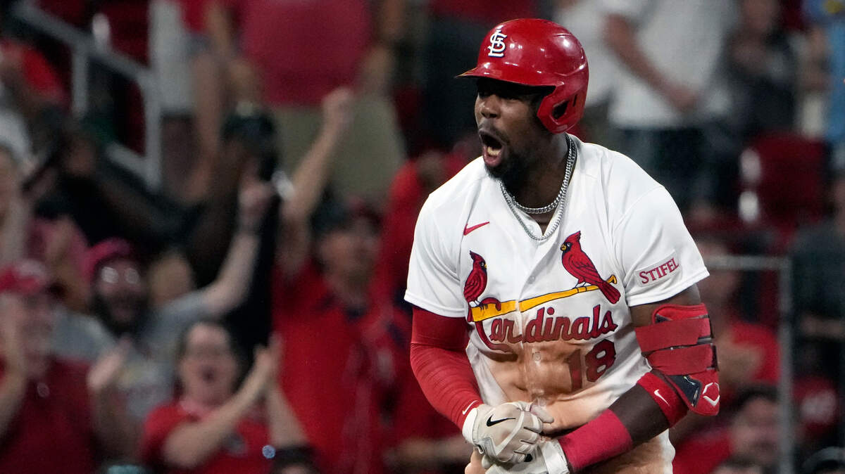 St. Louis Cardinals’ Jordan Walker celebrates after hitting a three-run triple during the seventh inning of a baseball game against the Oakland Athletics Monday, Aug. 14, 2023, in St. Louis. (AP Photo/Jeff Roberson)