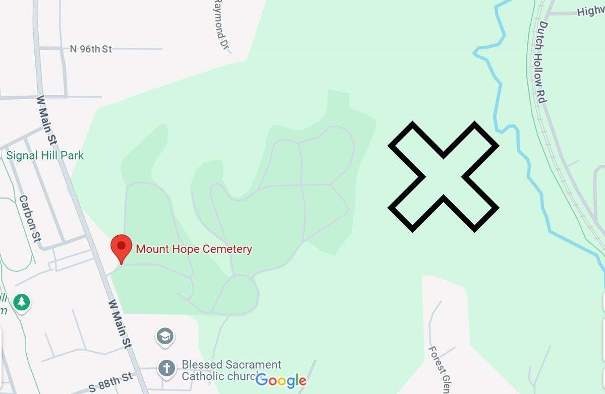 An X marks the site where a solar farm is planned, next to burial grounds at Mount Hope Cemetery in Belleville. Opponents want the city to stop the project and preserve green space.
